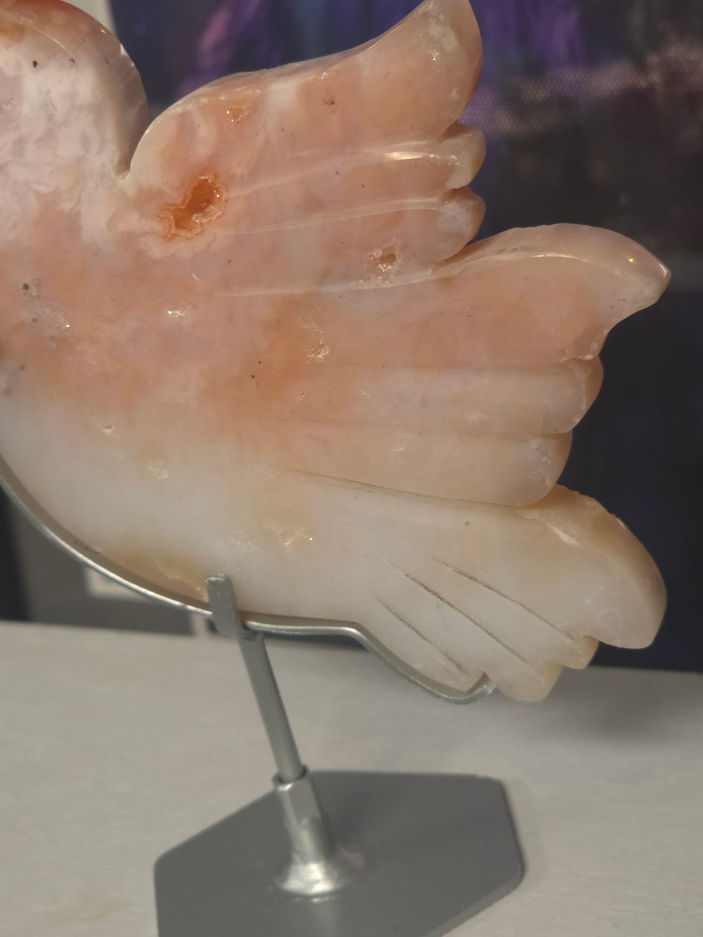 Pink carnelian bird on stand hand carved Indonesia