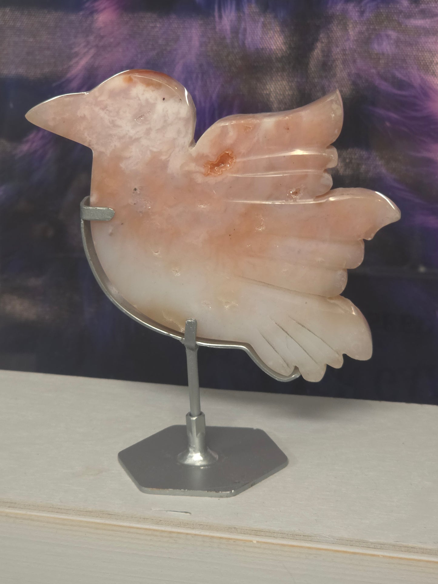 Pink carnelian bird on stand hand carved Indonesia
