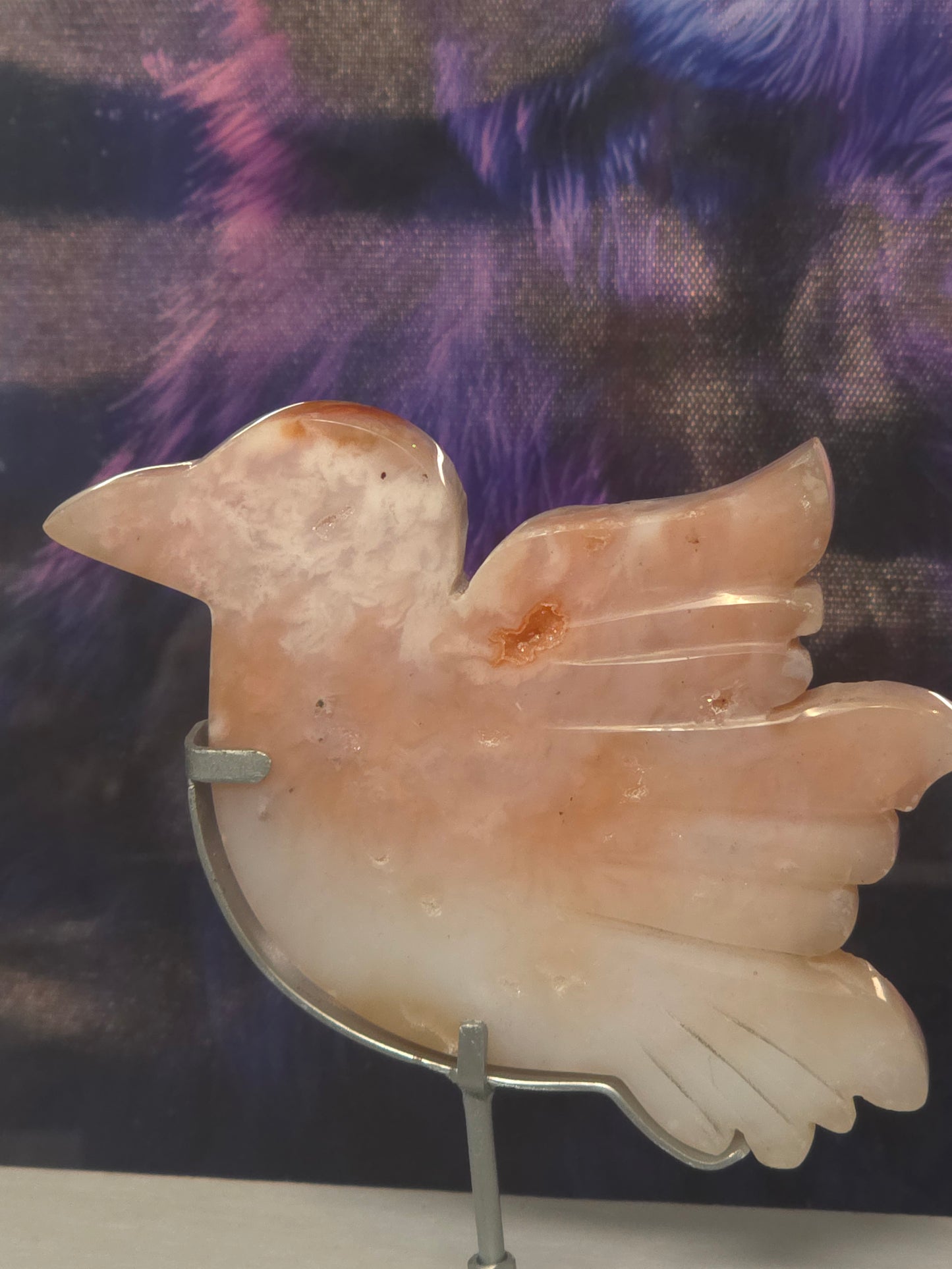 Pink carnelian bird on stand hand carved Indonesia