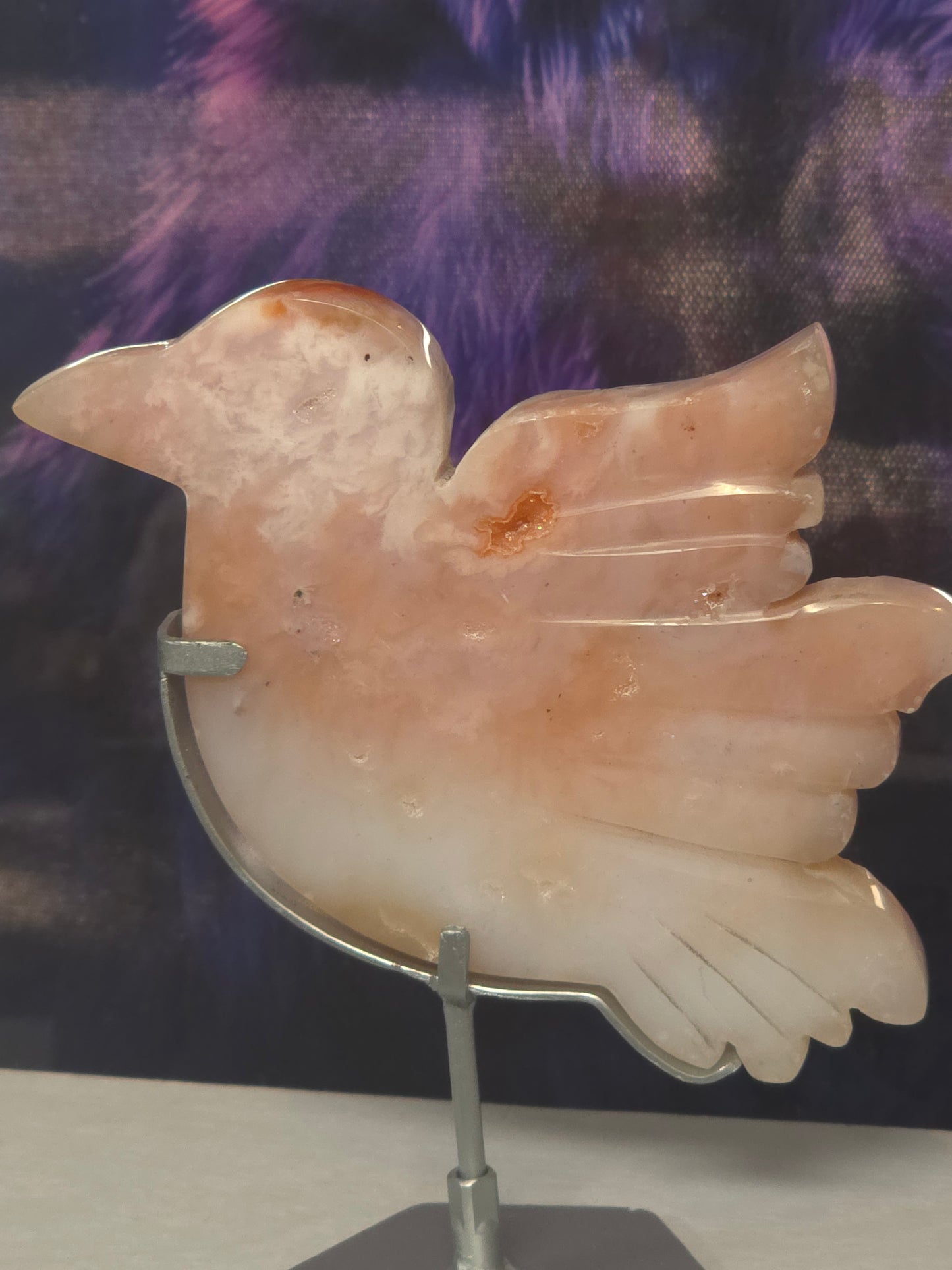 Pink carnelian bird on stand hand carved Indonesia