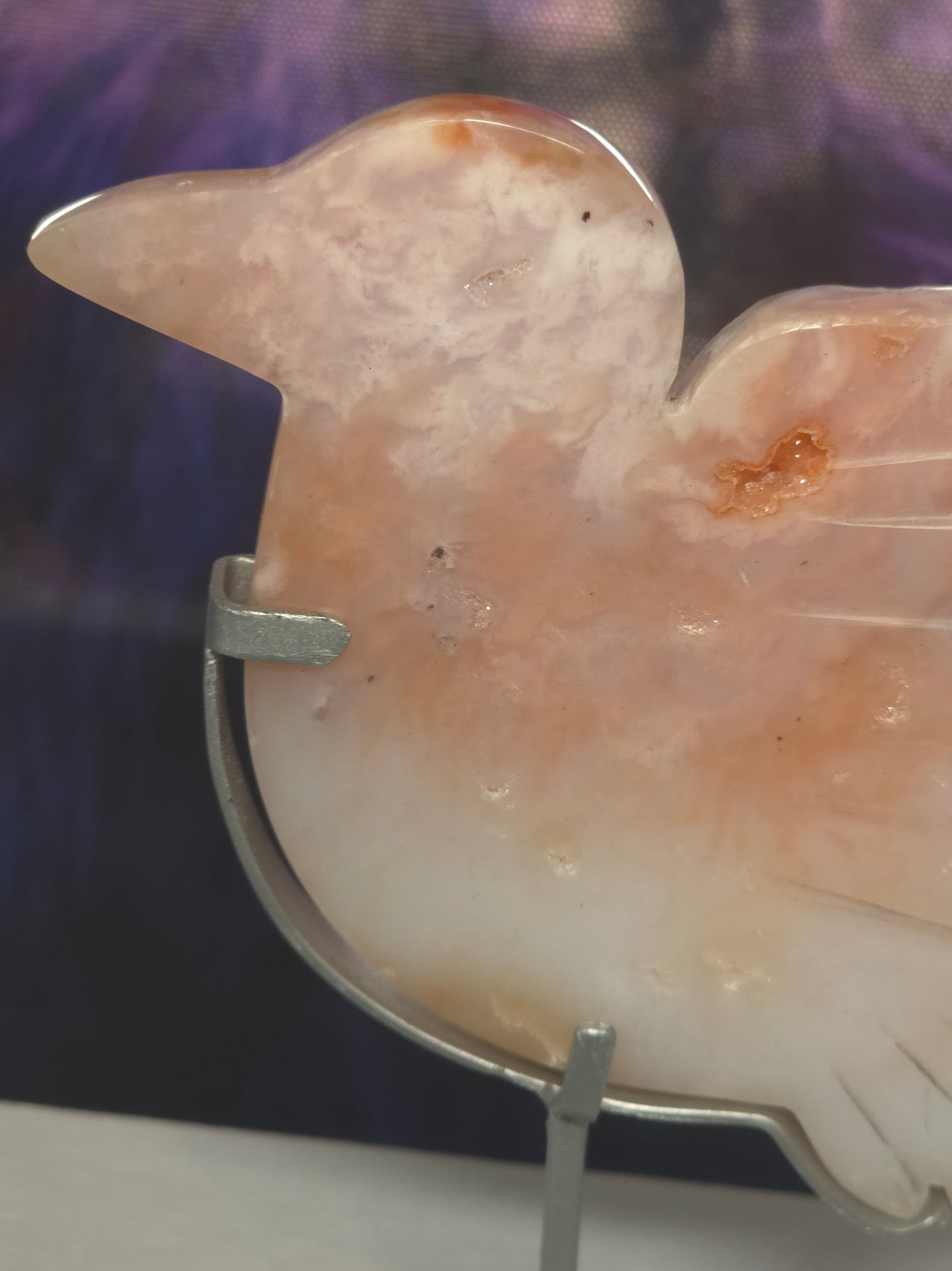 Pink carnelian bird on stand hand carved Indonesia