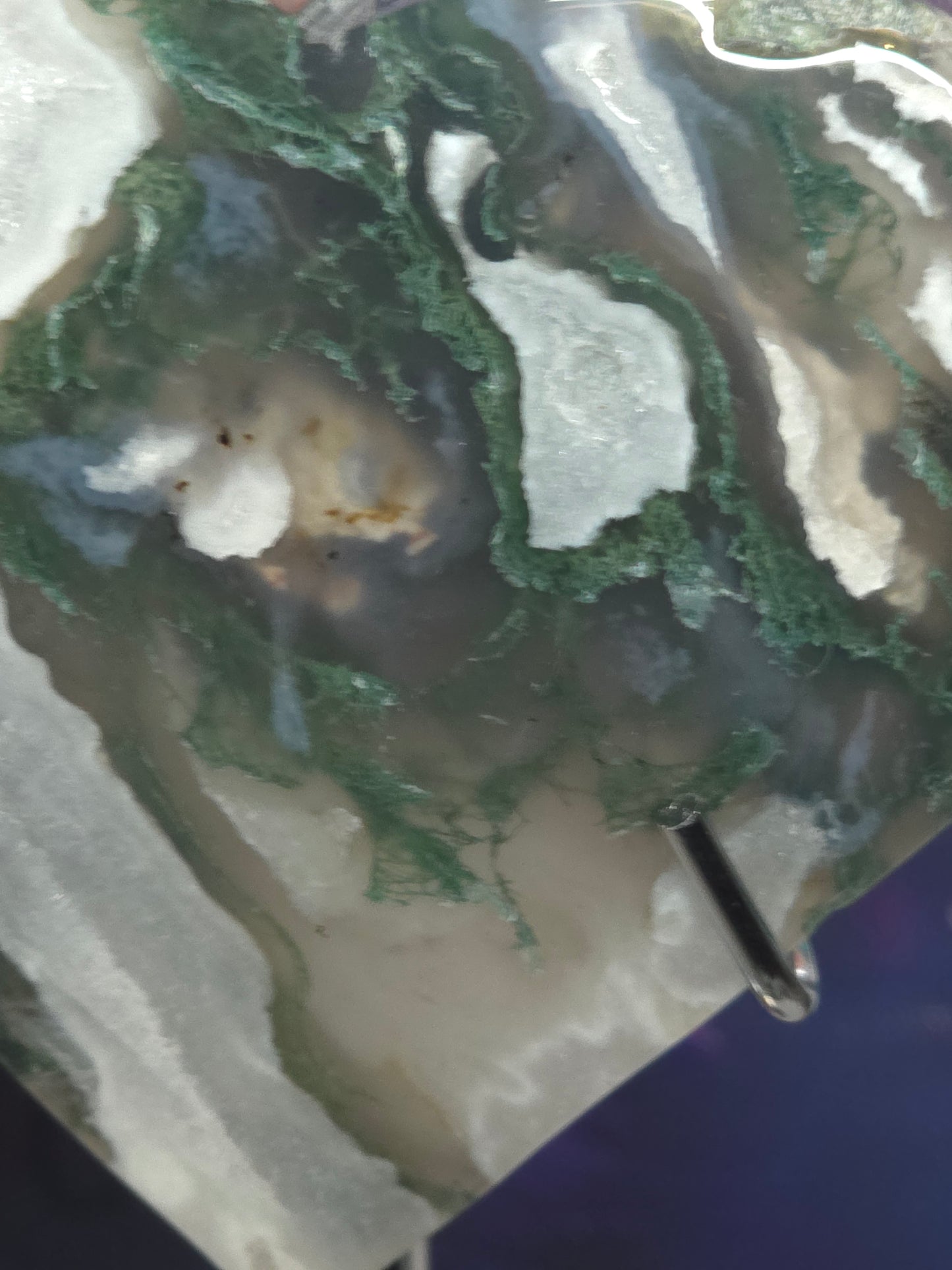 Moss agate heart on stand